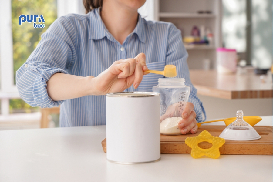 Nguyên nhân pha sữa bột bị vón cục